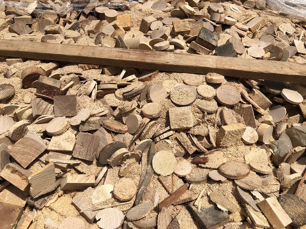 waste wood planks and blocks from pallet manufacturing factory