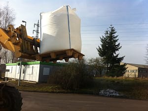 presswood pallet on a fork, loading a jumbo bag